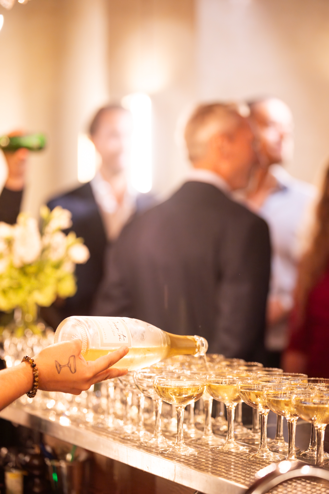 Champagne being poured.